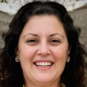 Smiling middle-aged woman with healthy skin.